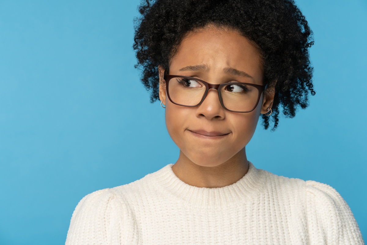 Portrait of Shy Awkward Young Woman